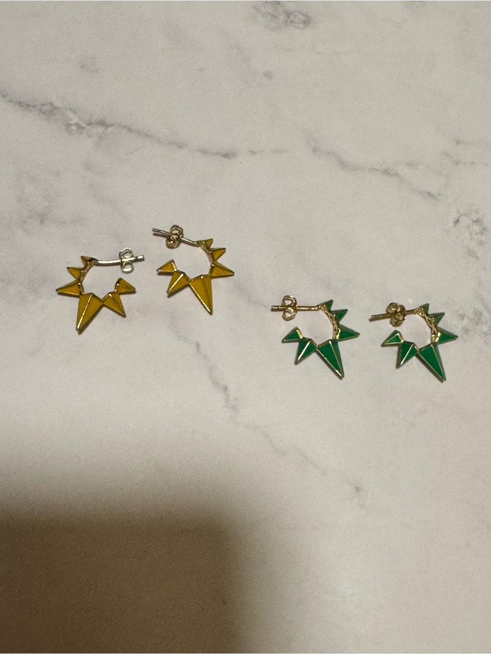 Yellow and green starburst spike hoops
